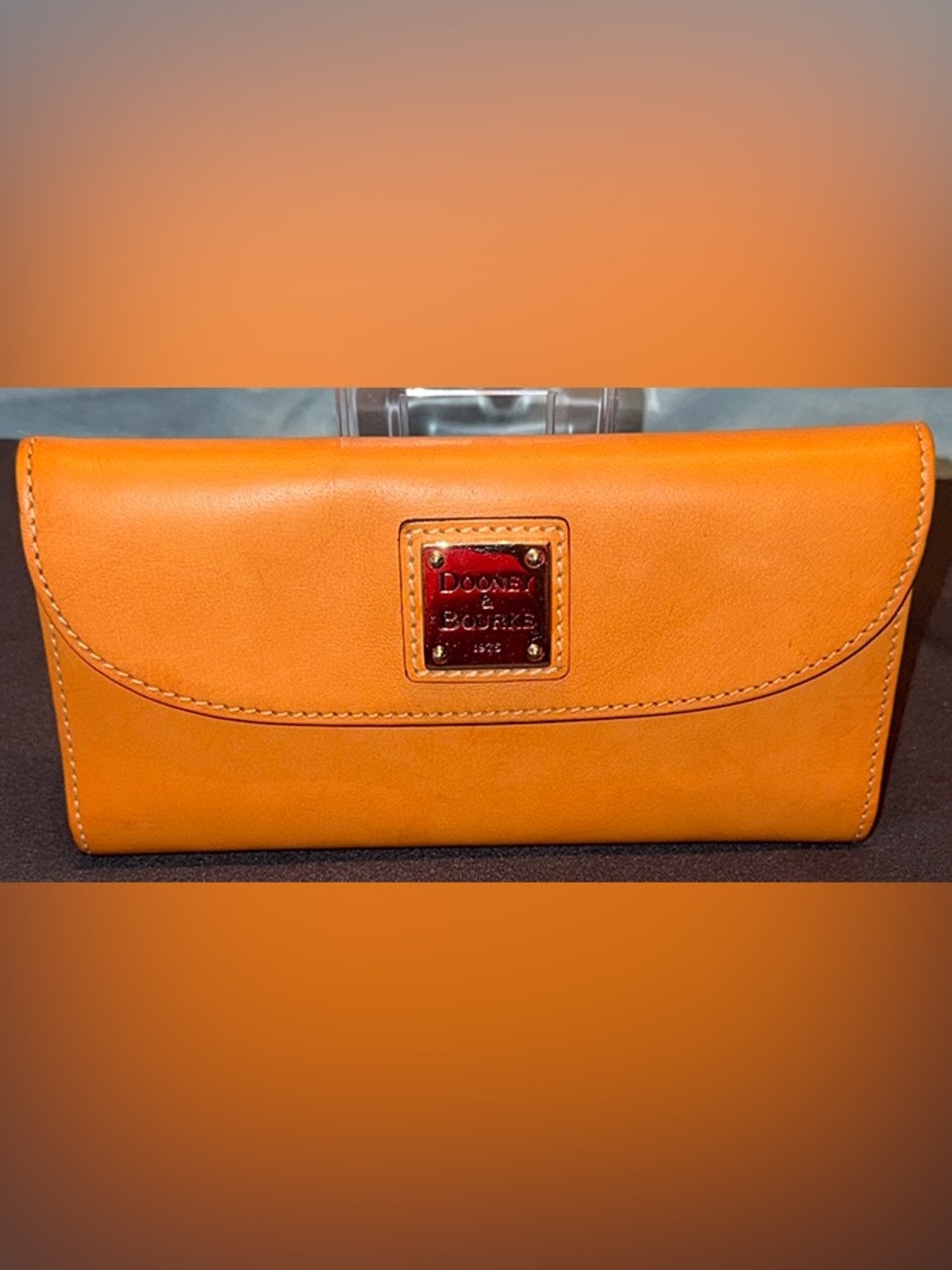 Dooney & Bourke Bright Orange Leather Wallet with Logo Plate